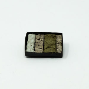 Helga Mogensen, Driftwood brooch #8, Oxidised copper, Icelandic driftwood, fish leather
